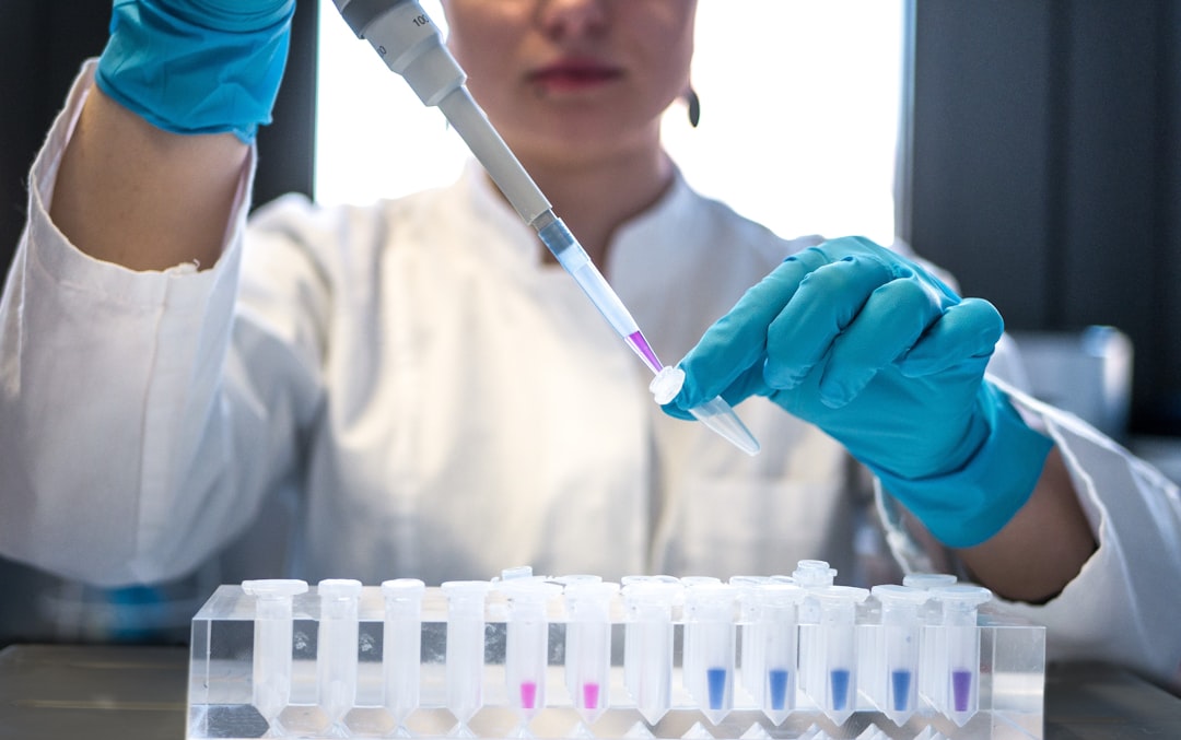 Laboratory technician analyzing mold air quality sample from Houston property